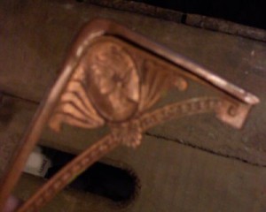 backside of embossed antique copper bookmark